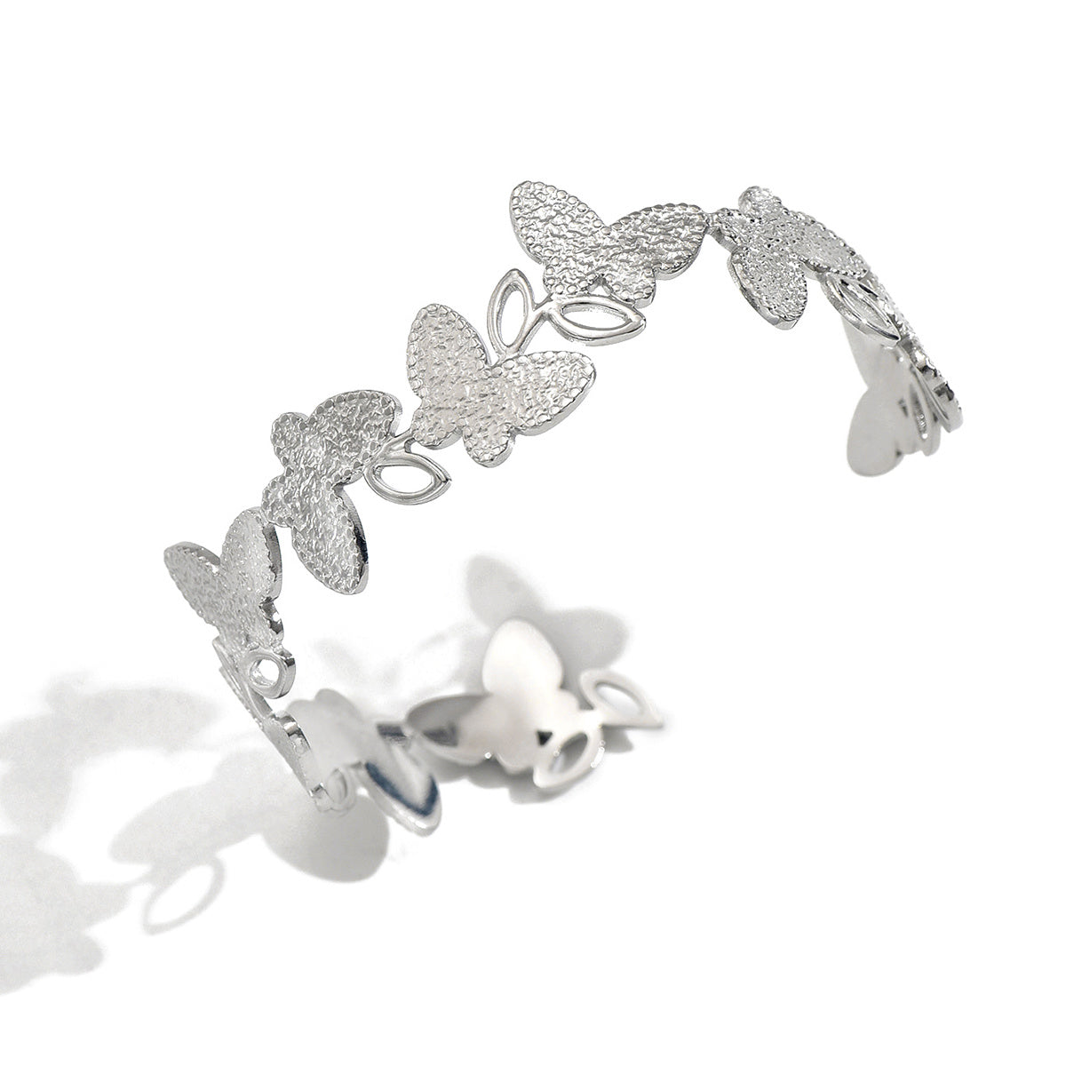 Glimissy Platinum-Plated Petal Bangle – Carved Elegance